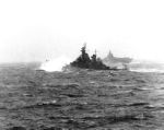 With Admiral Halsey embarked, the USS New Jersey (BB 62) pounds her way north to intercept Ozawa