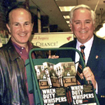 Howard Kazanjian (left), executive producer of <em>Raiders of the Lost Ark</em> and <em>Return of the Jedi</em>, attends one of John's book signings.
